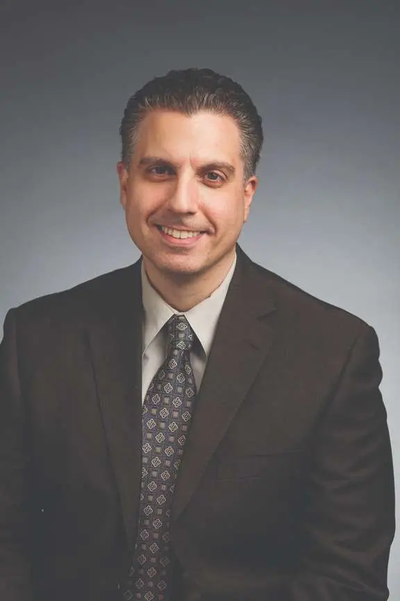 W Michael Kutayli, MD